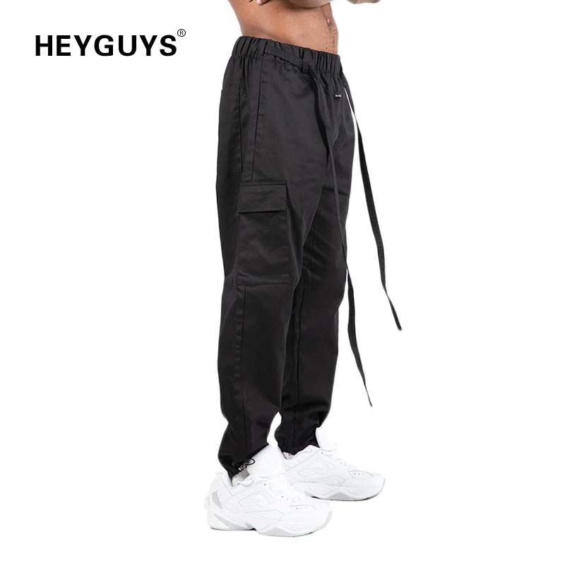 

HEYGUYS fashion Long Pants Men Casual FOG Jogger Trousers Fashion Fitted Bottoms street wear hip hop street Button design
