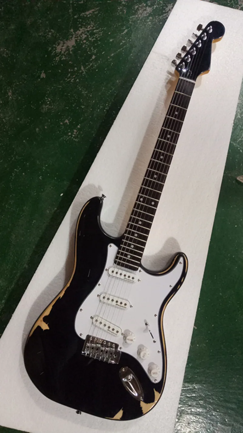 

Factory custom 2019 New black Manual remains ST electric guitar Silver hardware SSS pickup Can be Customized free delivery