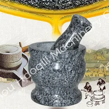 Традиционная ручная каменная мельница