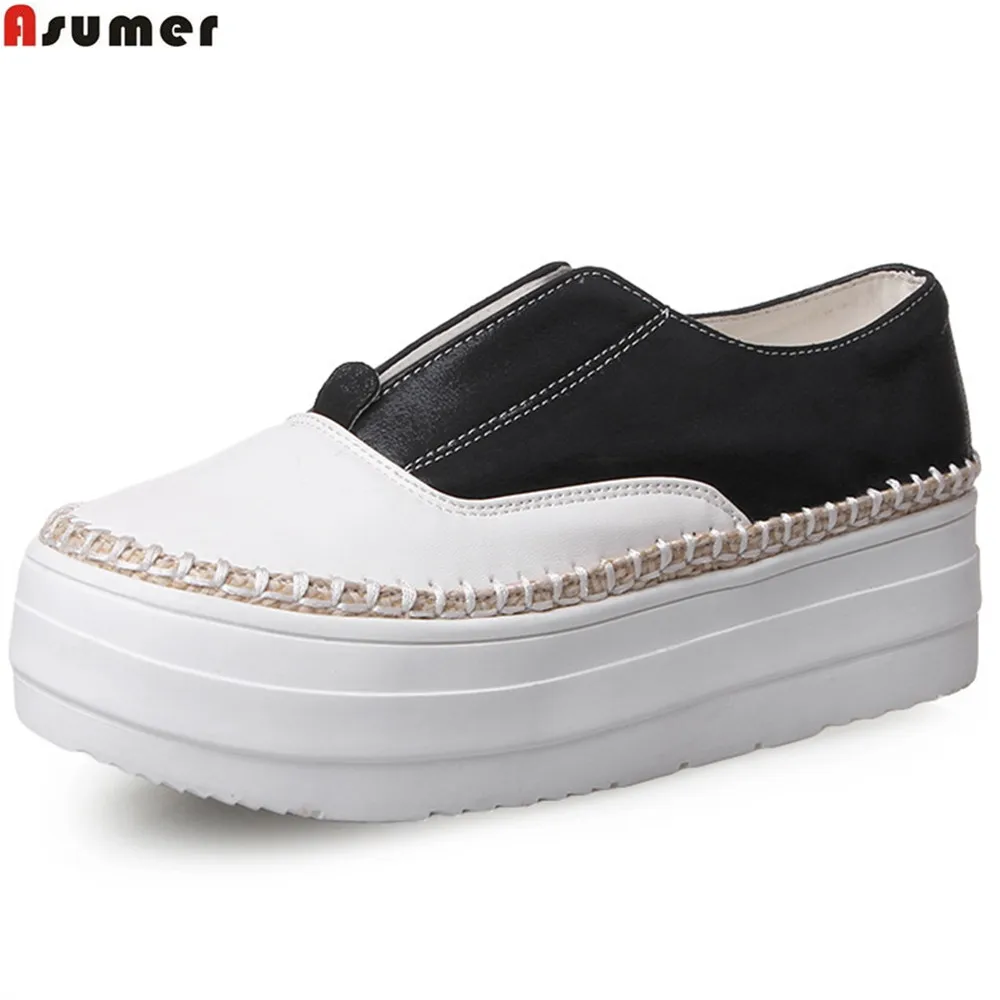 flat black and white shoes