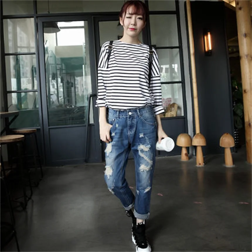 

Women's spring and summer new large size hole Korean version of the nine pants pants Harlan nine pants loose jeans TB18308