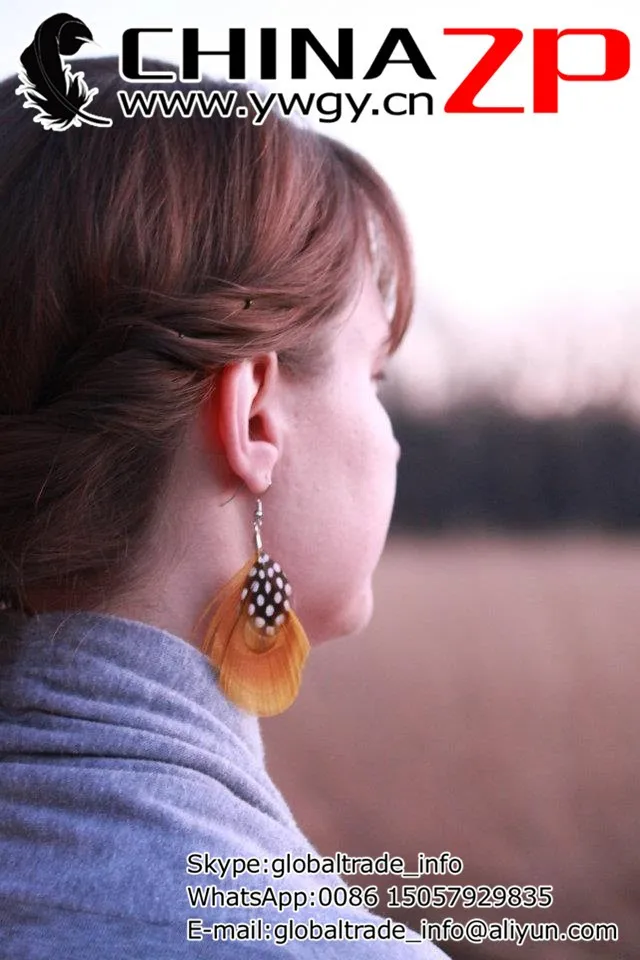 TALIA Gold Peacock Feather Earrings1