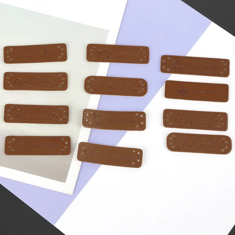 

12pcs Retro Brown Synthetic PU Leather Labels Embossed Handmade Label Tags DIY Sew Craft Patch Garment Labels Sewing Accessories