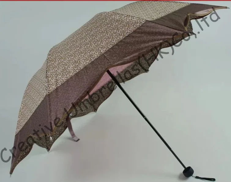 

Maple leaves umbrella,leopard printed design,8 ribs,three fold,manual umbrellas,imitation paradise umbrella.OEM allowed