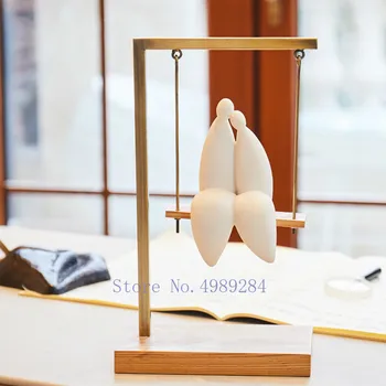 

Nordic Gold Resin Creative modern Home living room tabletop decorations Couple swing Housewarming gifts home decor