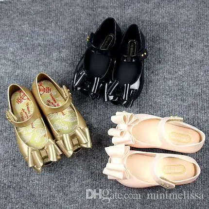 mini melissa gold shoes