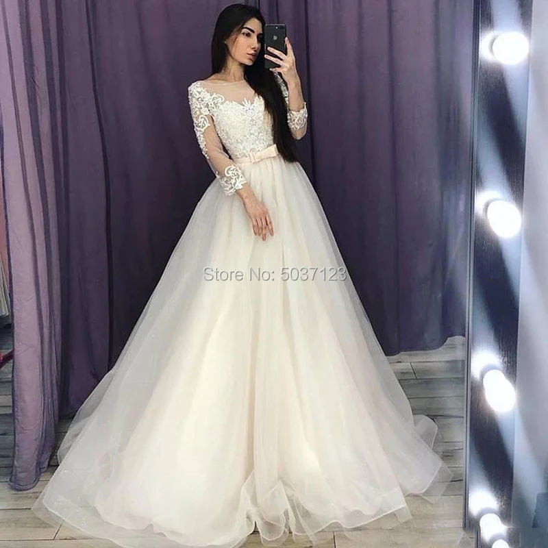 

Champagne A Line Wedding Dresses Vestido De Noiva Long Sleeves Button Tulle Sweep Train Floor Length O Neck Bridal Wedding Gown