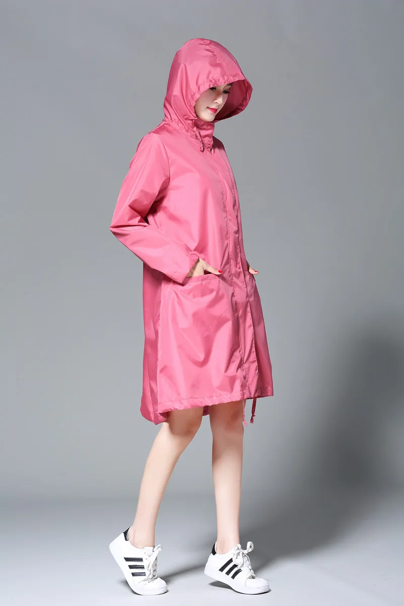 Freesmily Women's Stylish Rain Poncho Waterproof Rain Coat With Hood Sleeves and Pocket waterproof raincoat