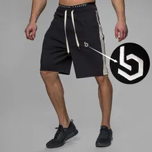 Новые модные мужские спортивные пляжные шорты, хлопковые спортивные брюки, свободные шорты для фитнеса, тренировочные штаны средней длины