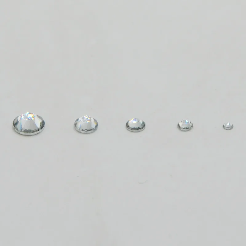 

HOT 100pcs/lot Crystal Clear Color DIY Apparel Rhinestone Flatback Non Hot Fix mix Rhinestones For Fashion decoration Nail Art