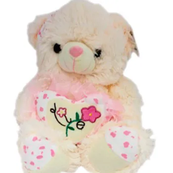 

Osita's stuffed toy with heart flowered