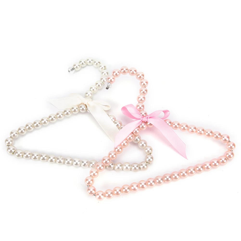 

Plastic Pearl Beaded Bow Clothes Dress Coat Hangers New Save Space Storage Organizer Dry Rack Wedding For Newborn Kid Hot