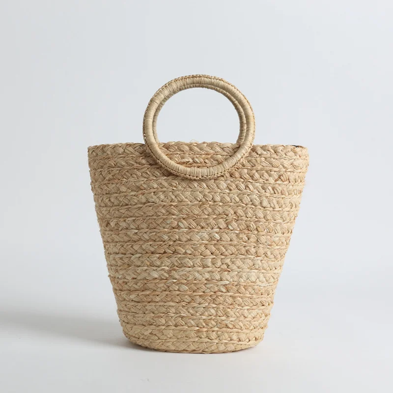 

2019 Korean Version Original Design Ins Wind Ring Handle Ladle Barrel Bag Pure Hand Woven Straw Bag