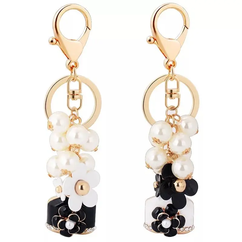 

New Pearl Flower key ring alloy charm perfume bottle car key chain female bag accessories key chains keychain