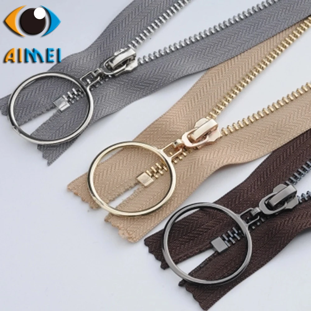 Metal zipper really copper and iron teeth bright silver light gold