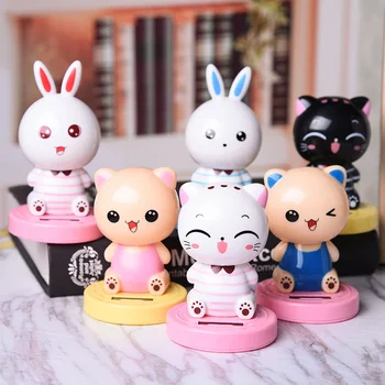 

Car decoration solar energy dancing shaking head Cartoon Bear rabbit pig dashboard car ornaments lovely articlesgifts