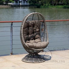 Мебель современная кресло-качели-желто-коричневая корзина с серой подушкой