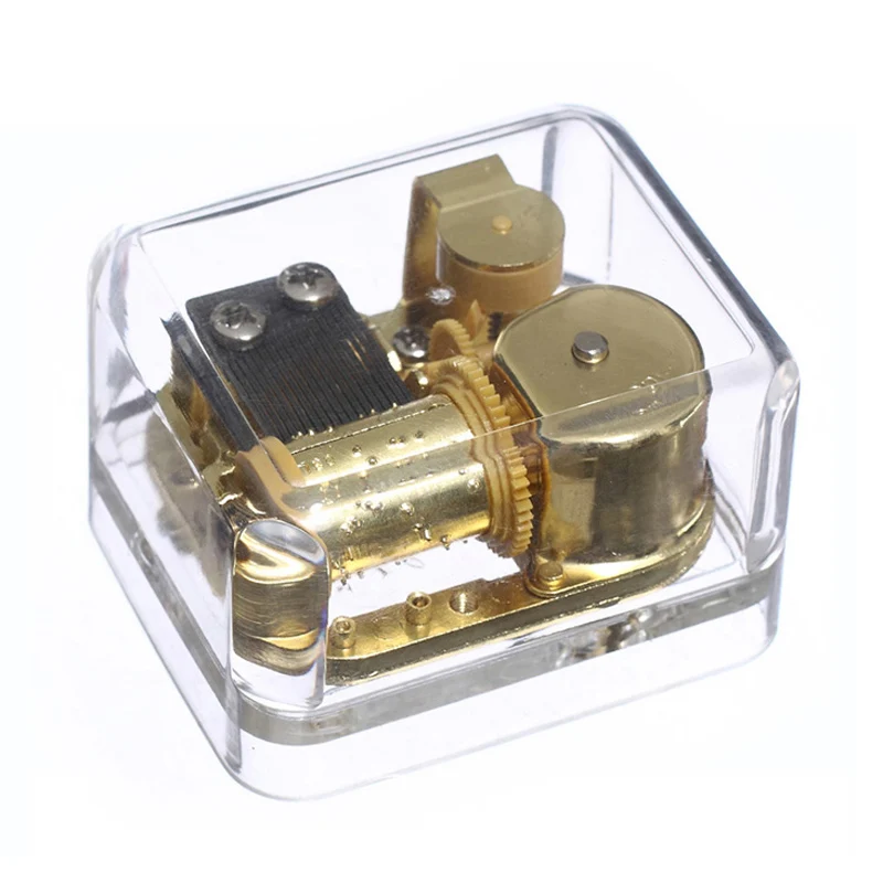 

Plastic Windup 18 Note Music Box Gold Movement Transparent Musical Toys Christmas Gift for Kids,Different Songs Available