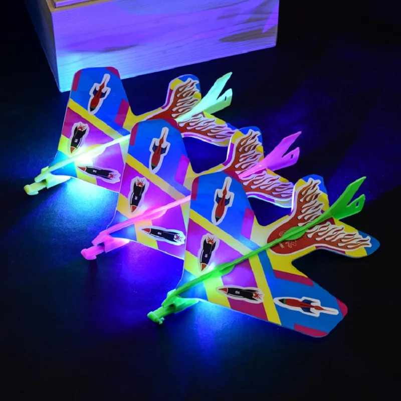 20pcs/lot Stretch Flash Arrows Aircraft Catapult light Flying Toys Helicopter DIY elastic Luminous ejection aircraft kids toys | Игрушки и
