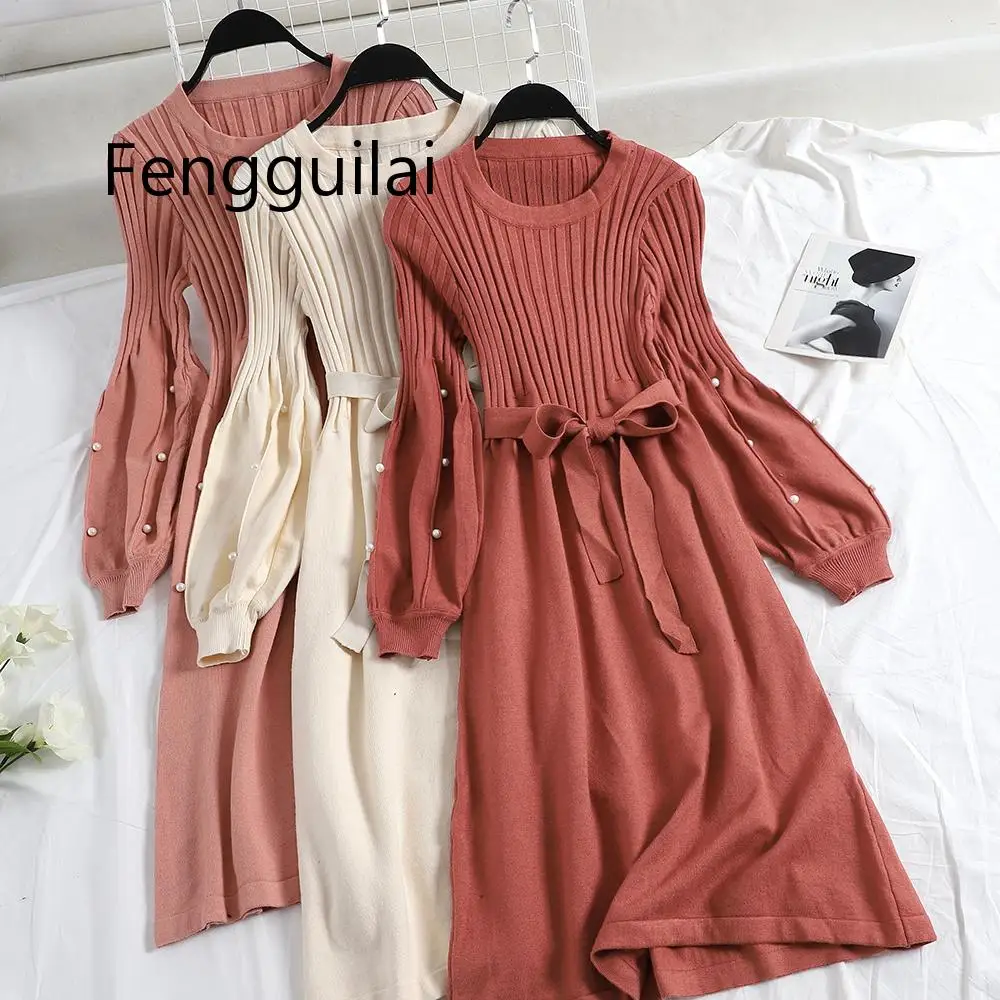 

2019 winter new female O-neck beading lantern sleeve knitted bottoming dresses women solid color elegant A-line sweater dress