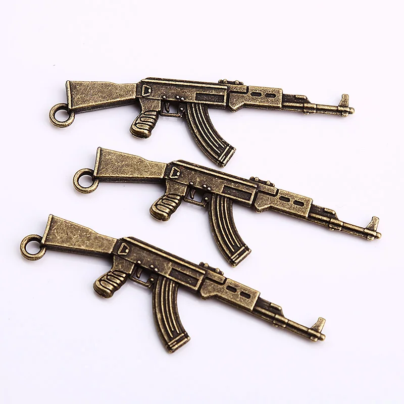 

Vintage Brass Metal AK47 Gun Charms for Jewelry Making Diy Zinc Alloy Weapons Gun Pendant Charms 10pcs/lot C8949