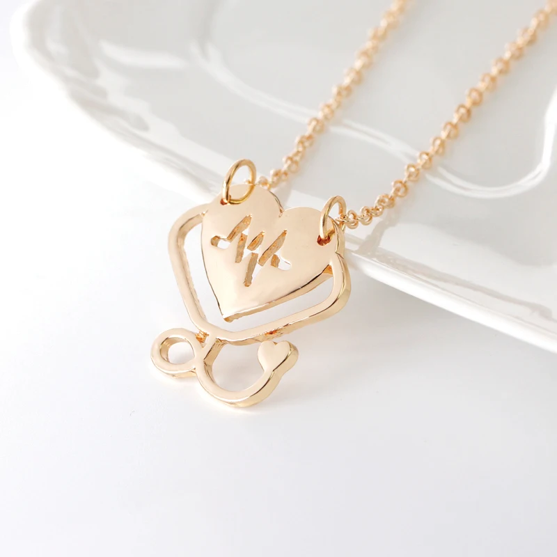 

Fashion simple woman heart-shaped pendant necklace hot sale creative stethoscope electrocardiogram alloy necklace