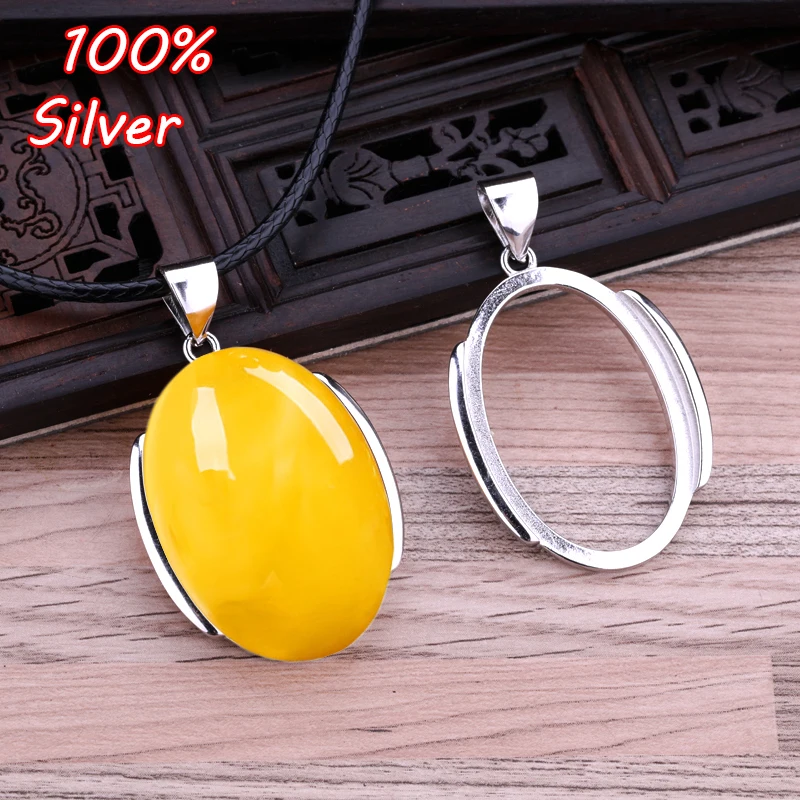 

20*30mm 100% 925 Sterling-Silver Color Plated platinum female pendant blank with honeyed amber ellipsoid.
