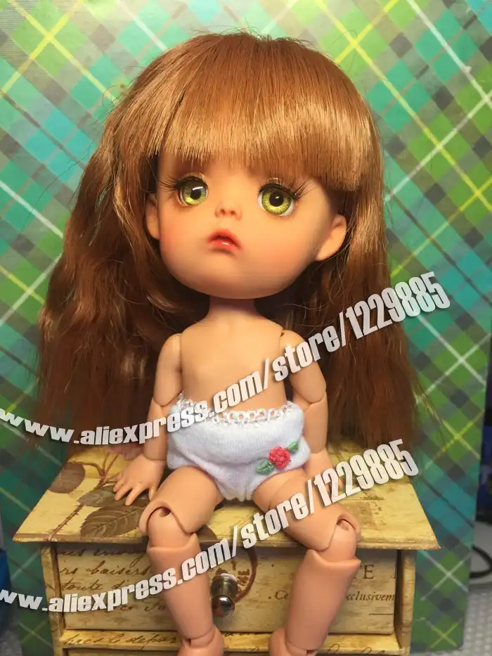 Boneca cabeça grande Clearance