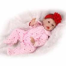 Nicery 22inch 55cm Reborn Baby Doll Magnetic Mouth Soft Silicone Lifelike Girl Toy Gift for Children Christmas Red Headwear Pink