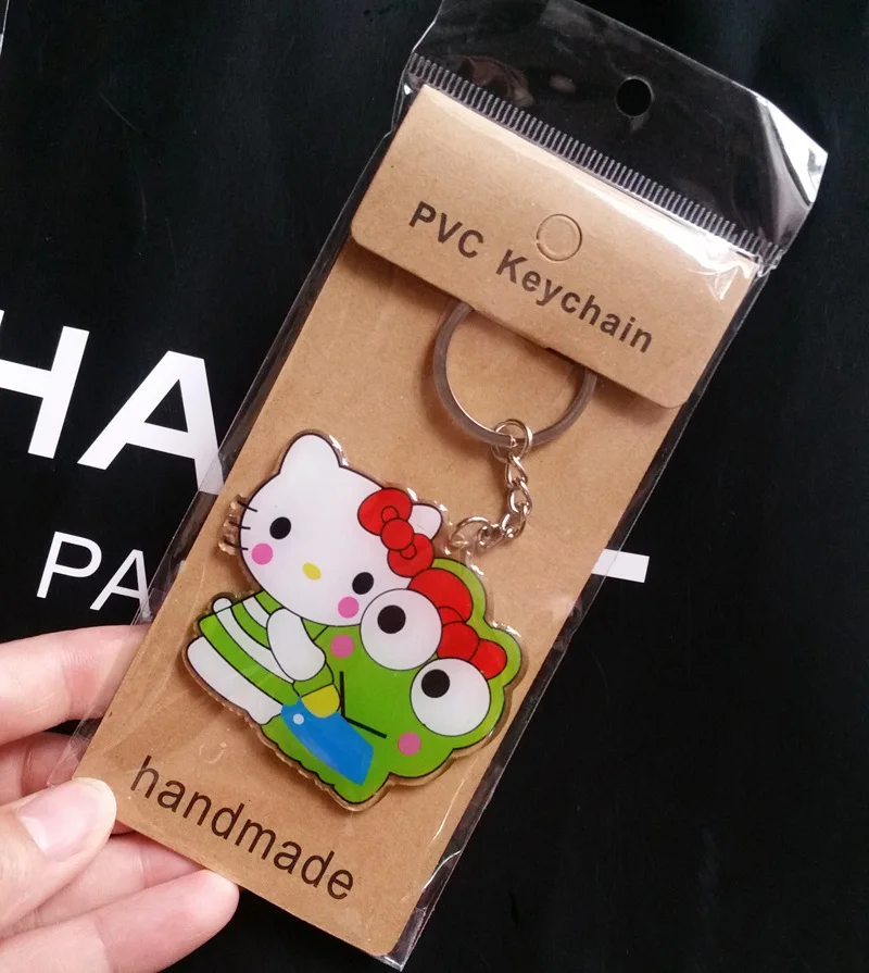 

20pcs 2019 New Kawaii Cartoon Acrylic Hello Kitty keychain bear dolls decoration girls toys bag keyring Gifts party favor