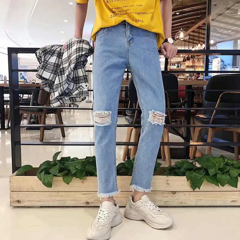 

Wholesale 2020 slim fit tassel New couple jeans men's Korean port wind summer knee hole pants raw Ankle Length pencil pants