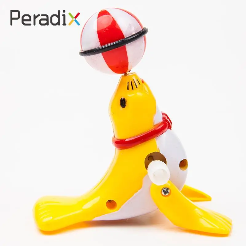 Sea Lion Wind Up Toys Clockwork 360 Degreen Rotation Top The Ball