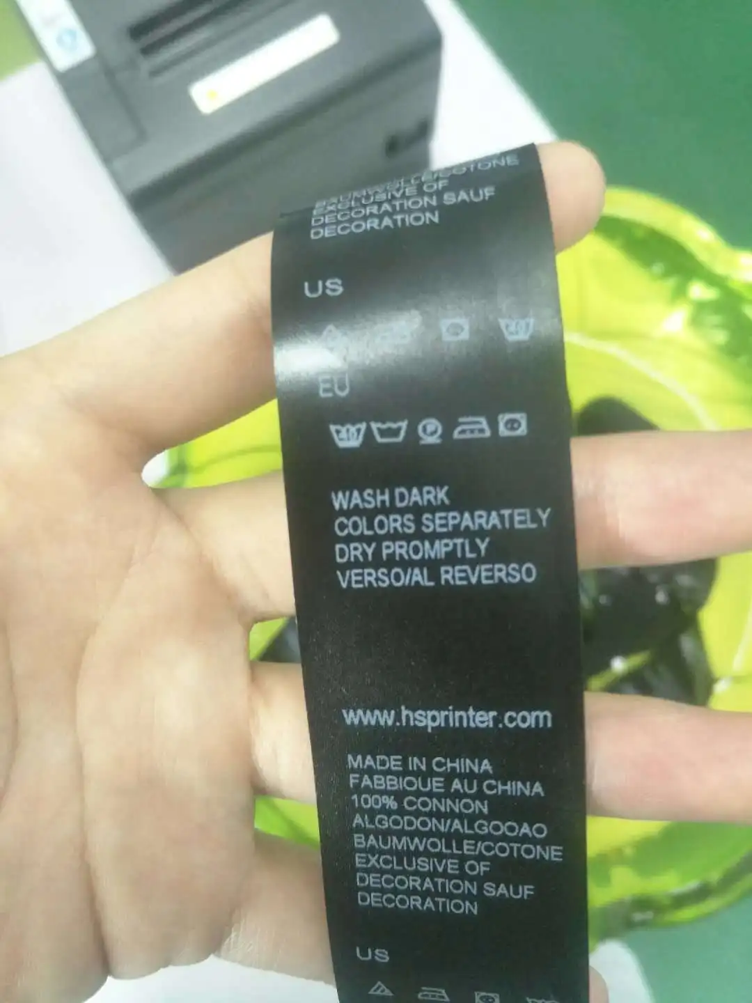 It is a graphic of Soft Shirt Label Printing Machine It is a picture of Soft Shirt Label Printing Machine
