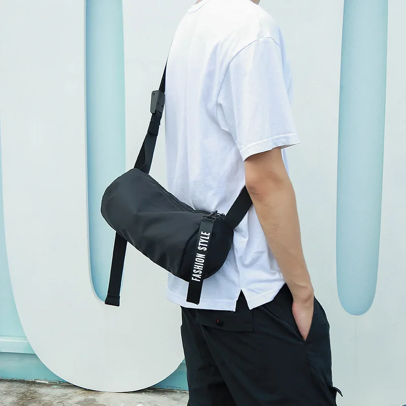 

New men's shoulder bag street hip hop wind simple sports waterproof Messenger bag tide men travel large capacity drum bag