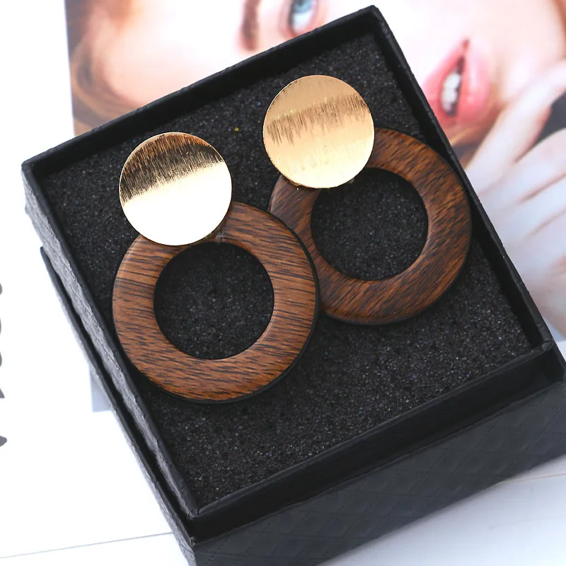 

hot fashion round metal sequin noble temperament hollow round wood circle sexy geometric OL Stud Earring Women jewelry
