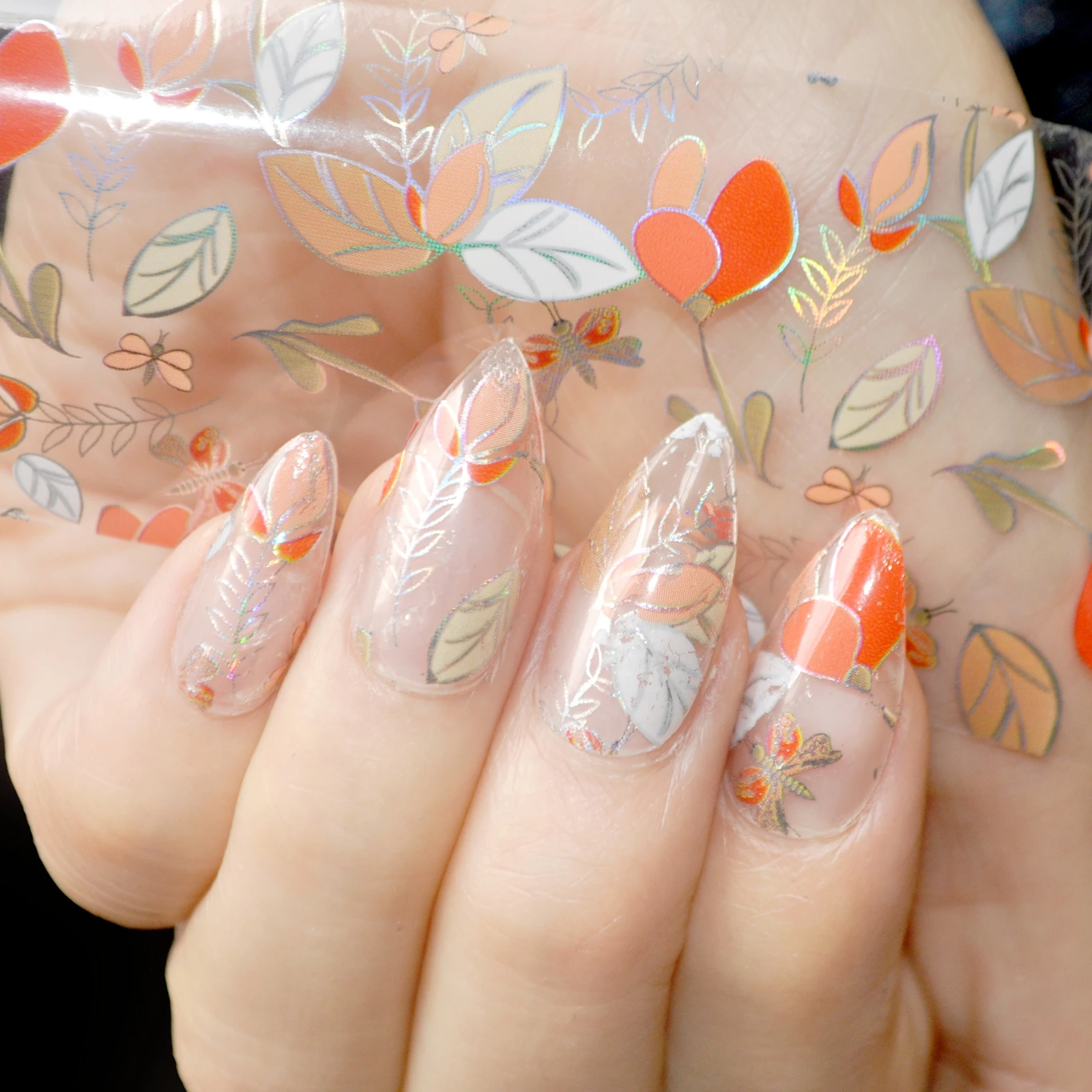 

1 piece= 1meter Leaves Design Nail Art Glue Transfer Foil Sticker Laser Leaf Orange White Clear Base Nail Decoration Accessories