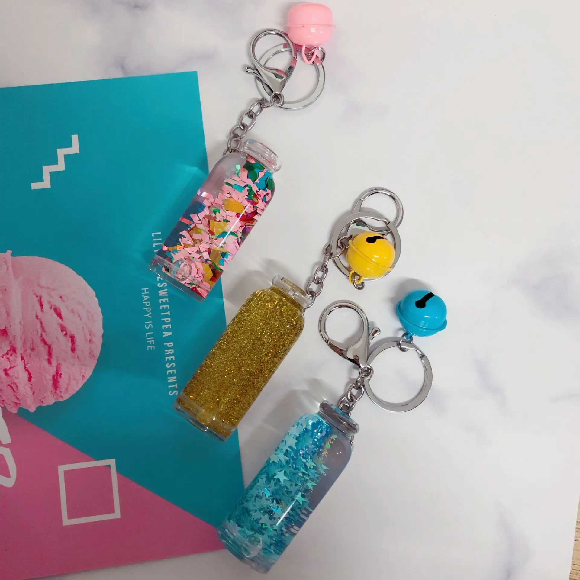 

2019 Fashion Liquid Quicksand Sequin Keychain Fantasy Drift Bottles Keyring Gift Pendant for Women Bag Car Key Pendant Jewelry