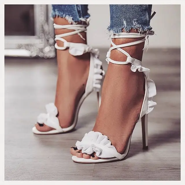 

New Europe and America ladies sandals 2018 summer new fish mouth lace cross straps 11 cm white high heels.