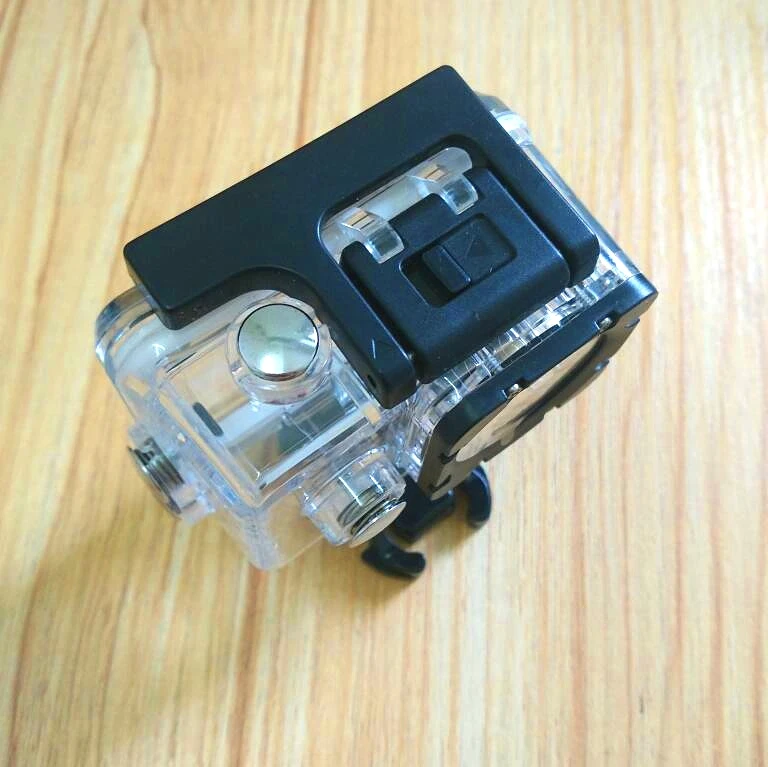 Coque étanche pour caméra d'action SJCAM H9R, vue latérale avec boutons accessibles et lentille protégée