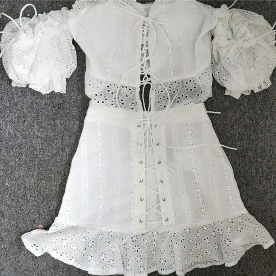 Luxury Brand 2018 Summer Women 2 Pieces Sets Strapless Solid White Top and Mini-skirt Off The Shoulder Hollow Out Sexy Women Set Women's Sets