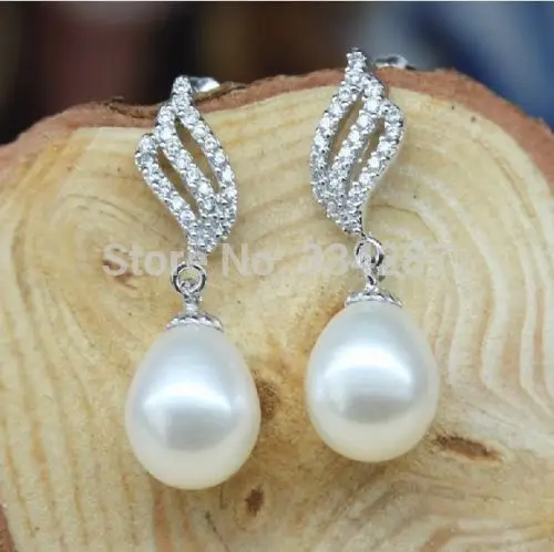 

Fine 9-10mm white Oval AAA+ pearl Dangle earrings