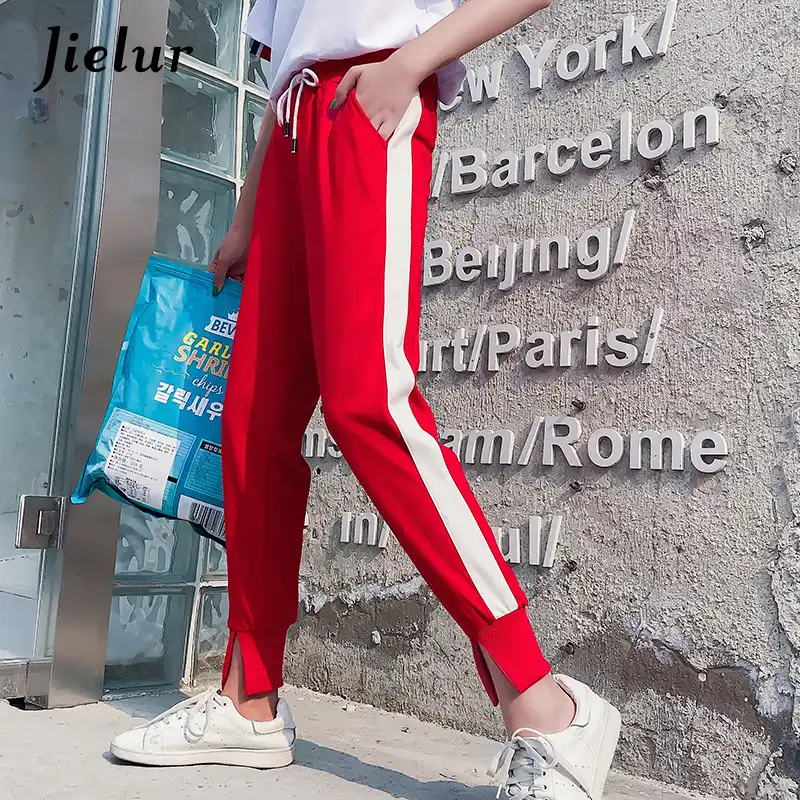 red trousers with white stripe