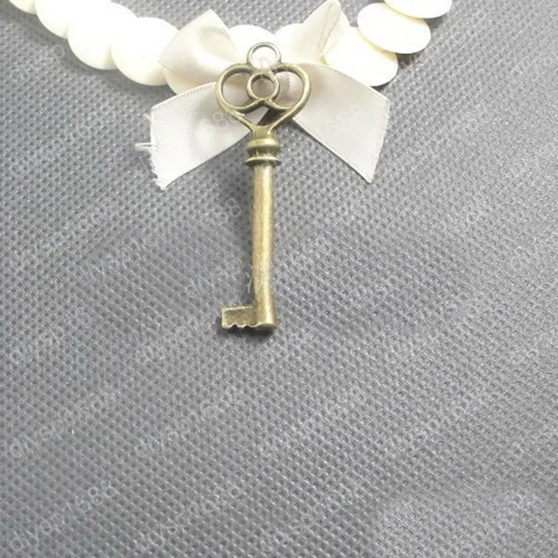 

send the new design of ancient bronze metal key pendant 63*20MM 20pcs/lot for DIY jewelry accessories 011001017