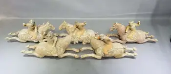 

A set of chinese tri-coloured glazed pottery women girl horsemanship horse