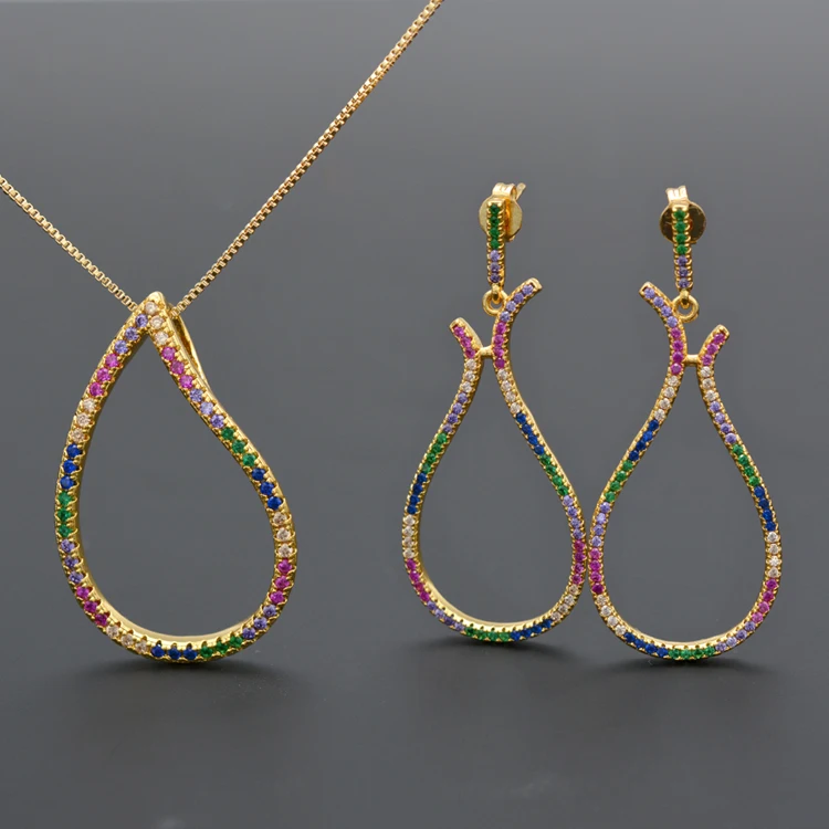 

Golden cutout earrings and necklaces inlaid with colored cubic zirconia sparkling individual luxury women's jewelry