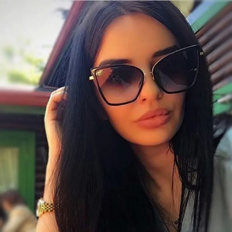 black aviator sunglasses with gold trim