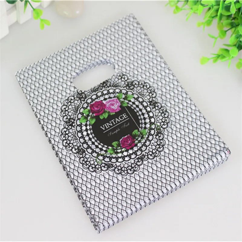 

Hot Sale Wholesale 100pcs/lot 15*20cm Luxury Vintage Birthday Bags Plastic Packaging Gift Bags