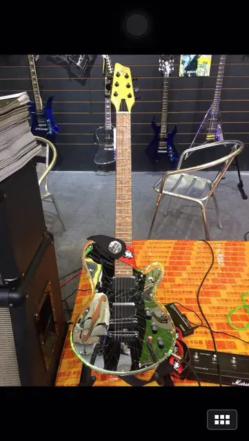 Cheap 2016 New  Shanghai Music Show high-End Mirror Top OEM electric guitar crystal  body with led light  active pickups flamed neck 