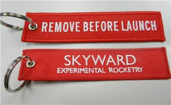 

Remove Before Launche Skyward Experimental Rocketry Fabric Embroidery Pilot Key Chains