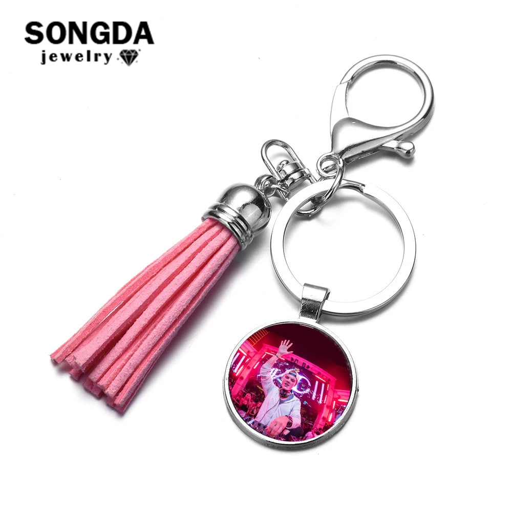 

SONGDA Print Avicii DJ Tim Bergling Fans Keychain Souvenir Wake Me Up Glass Cabochon Tassel Key Chain Car Key Ring Men Jewelry